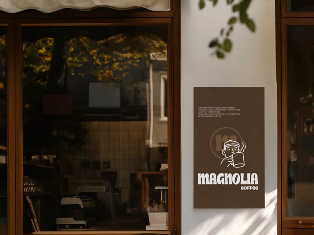Rótulo impreso en el escaparate de un local con ilustración y tipografía personalizada, ejemplo de diseño comercial coherente.