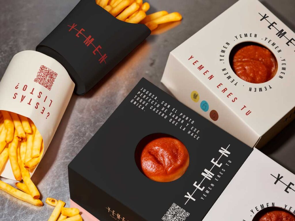 Packaging para restaurante de comida rápida, con diseño gráfico aplicado a envases y envoltorios.